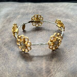 Seasonal Whispers Gold and silver with floral and rhinestone motif bracelet